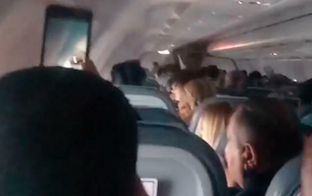 Məşhur meyxanaçı təyyarədə HƏYƏCANLI ANLAR YAŞATDI - VİDEO