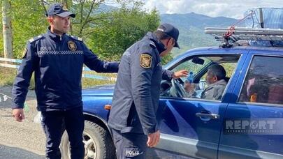 Azərbaycan polisi ermənilərə su payladı