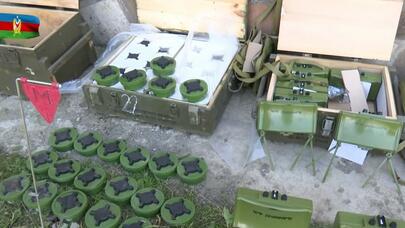 Qarabağda aşkarlanan sursat anbarlarının görüntüləri - Video