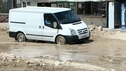 Bakının qışda palçığa, yayda toza çevrilən yolu - Video