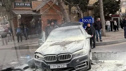Təmizlik işçisi maşınla köşkün arasında sıxılaraq öldü