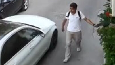Telefonunu maşına çırpıb pul tələb edirdi, saxlanıldı - Video