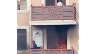 Alt qonşunun evi yanır, qadın da ev işlərinin hayında - VİDEO