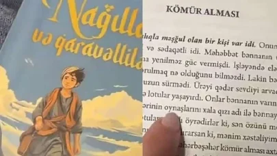 Övladına nağıl kitabı aldı, şoka düşdü - VİDEO