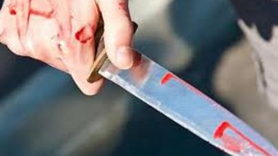 Ərinin həbsinə dözmədi, BOĞAZINI KƏSDİ