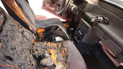 Avtomobildə unudulan mobil telefon partladı - Dəhşətli mənzərə - FOTO