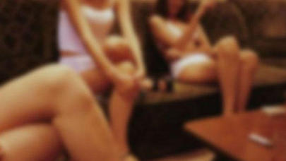 Əxlaqsızlıq yuvasında tutulan qadın: "Çəkməyin, ərim görər"