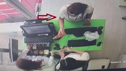 Qadının mağazadakı hərəkəti sizi şoka salacaq - VİDEO